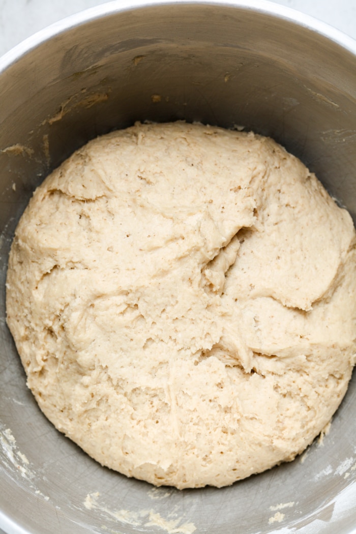 Risen dough in bowl.