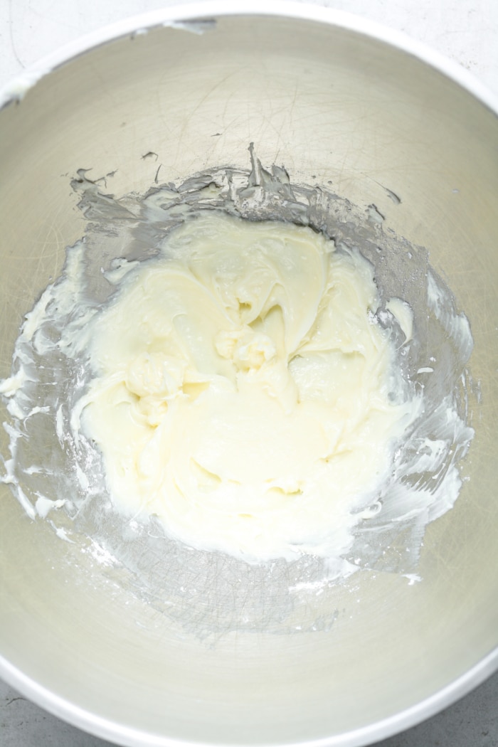Beaten cream cheese in bowl.