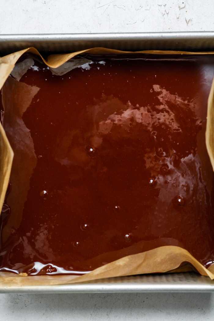 Melted chocolate in square pan.