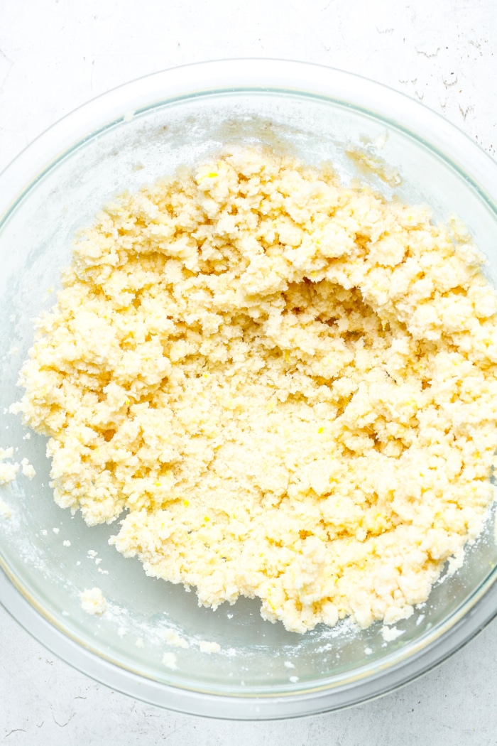Crumbly butter in bowl.