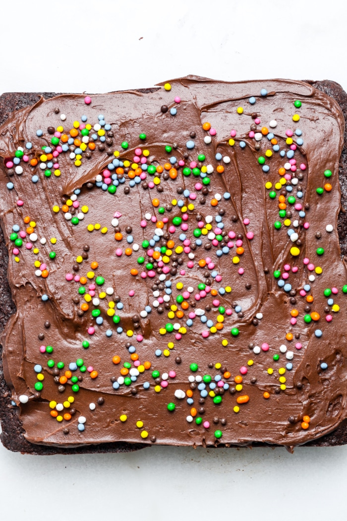 Sprinkles with chocolate frosting.