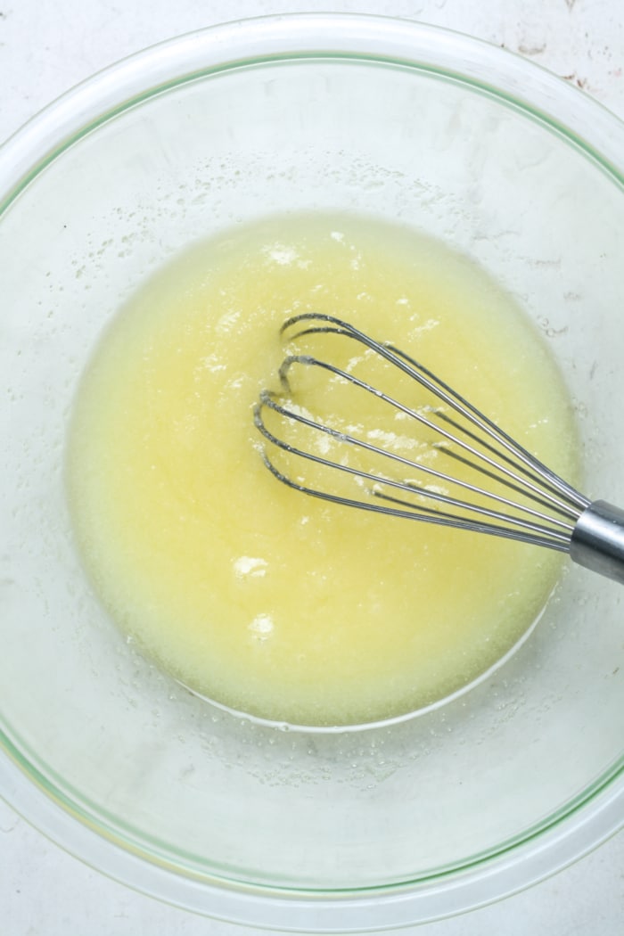 Whisk with creamy butter mixture.