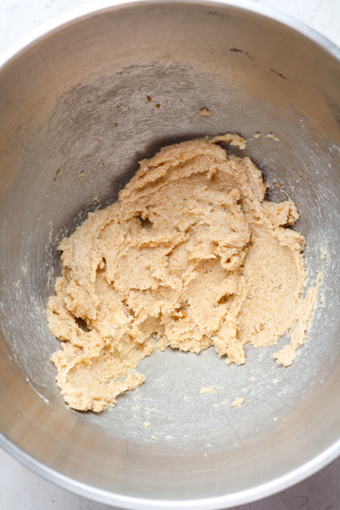 Sugary butter in mixing bowl.