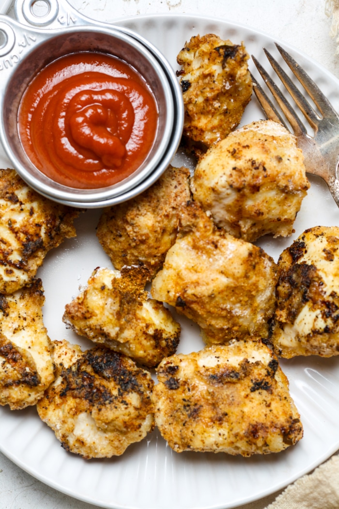 Popcorn chicken on plate.