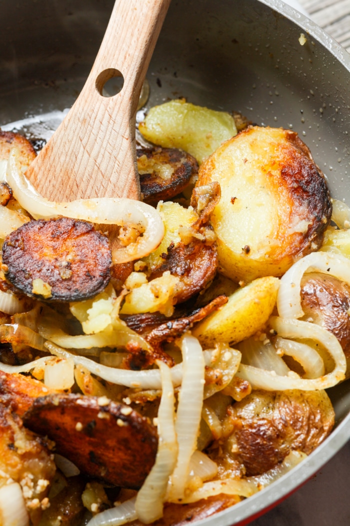 Golden spuds in skillet.