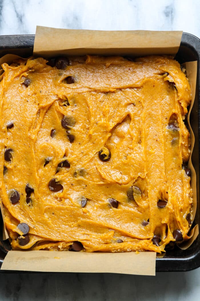 Square pan with pumpkin batter.