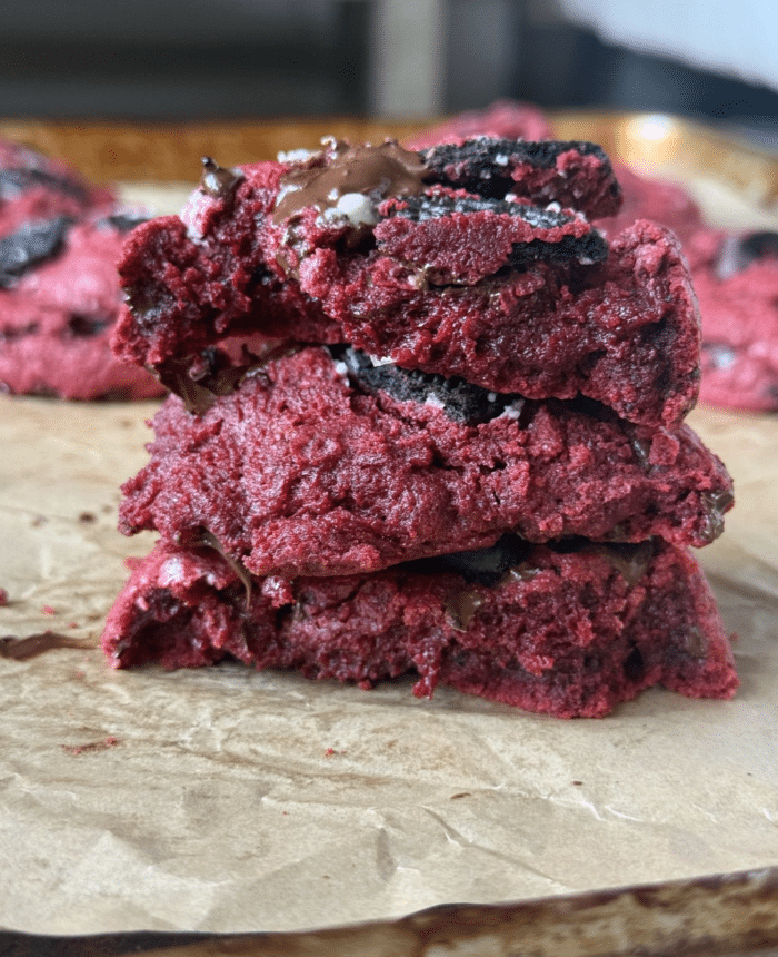 Stack of gooey red cookies.