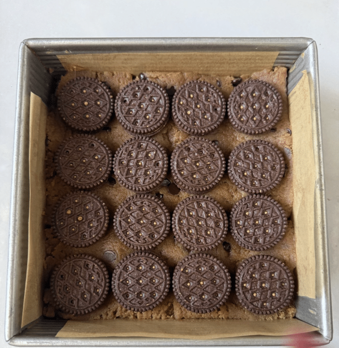 Sandwich cookies in pan.