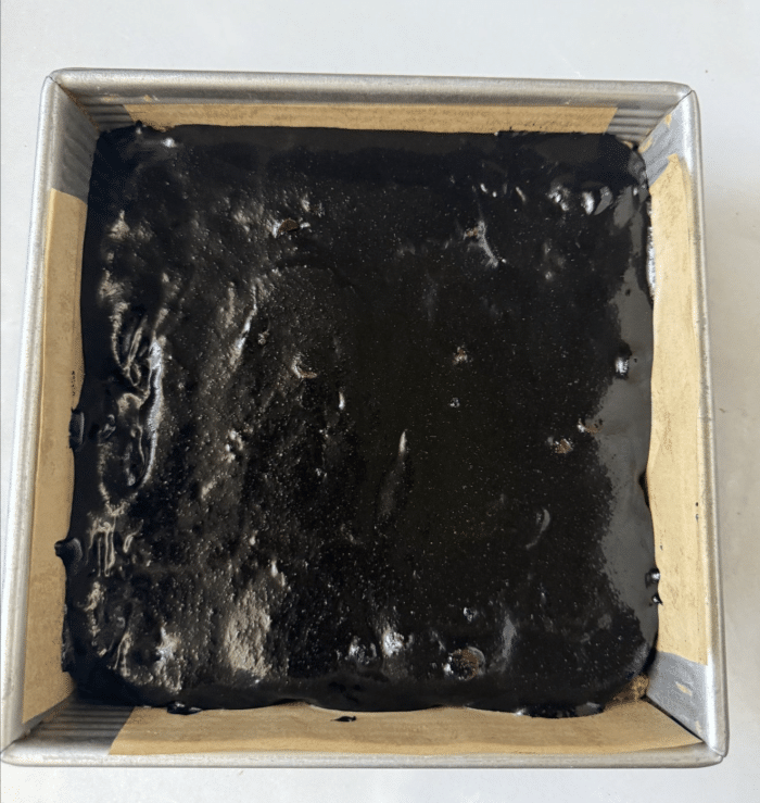 Brownie batter in pan.