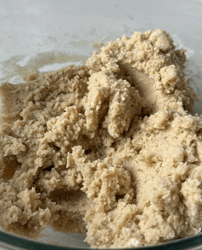 Thick dough in glass bowl.