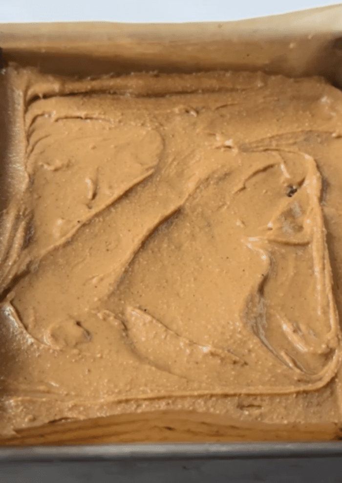 Creamy peanut butter in pan.