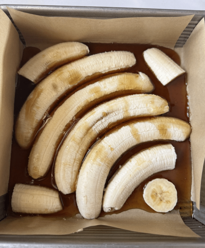 Caramelized bananas in pan.