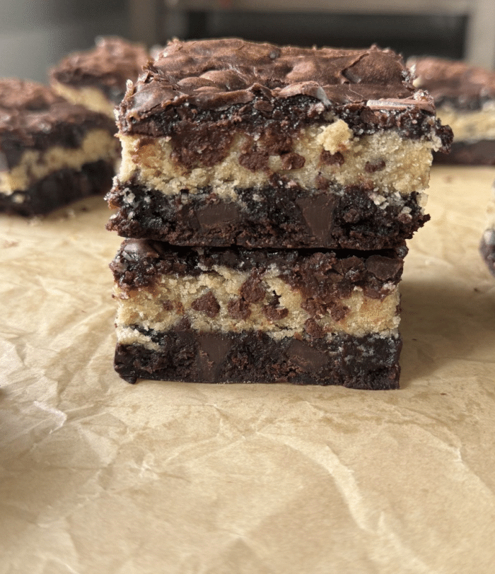 Stack of gooey brownies.