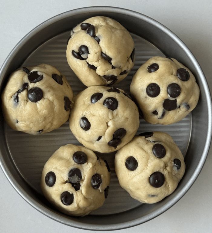 Chocolate chip balls in pan.