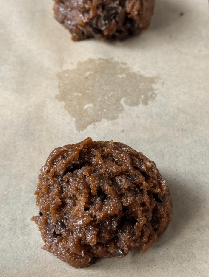 Gooey dough on parchment paper.