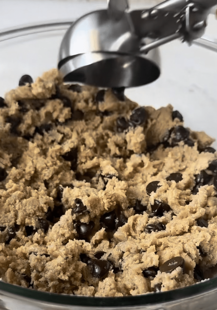 Scoop with dough bowl.