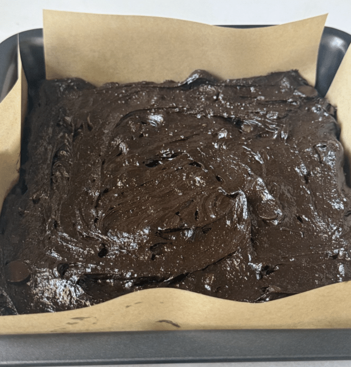 Chocolate batter in pan.