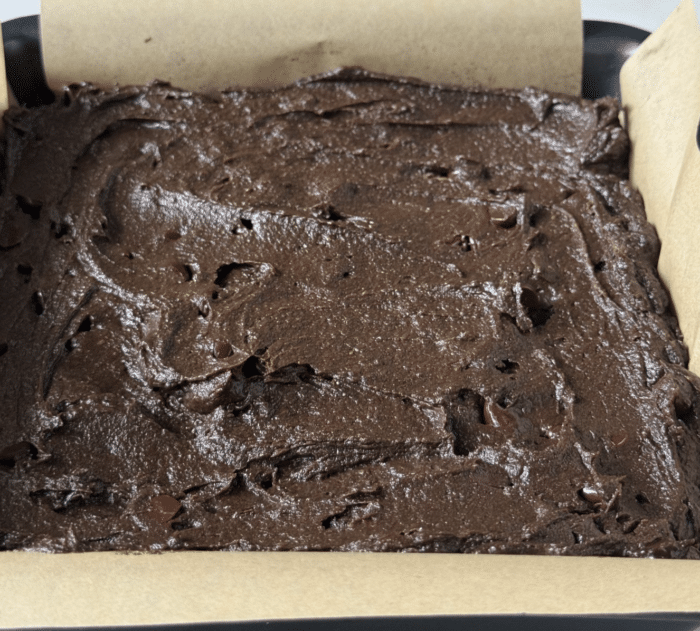 Square pan with protein dough.