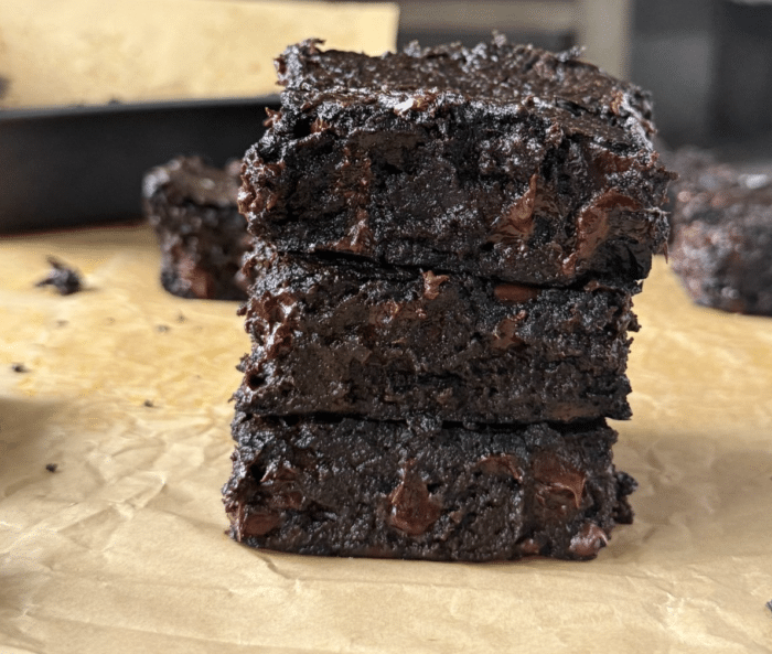 Stack of gooey brownies.