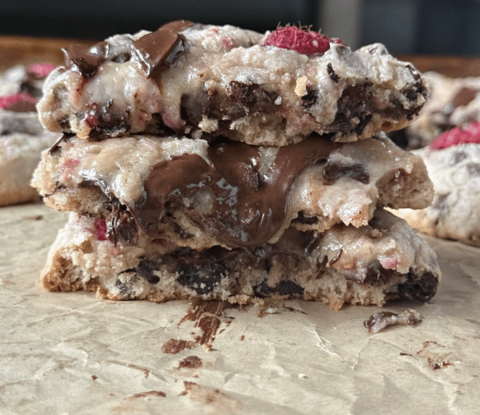 Stack of raspberry chocolate chip cookies.