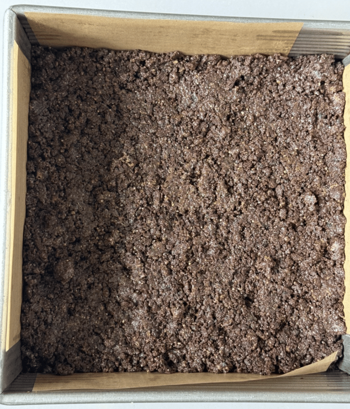 Cheesecake crust in pan.