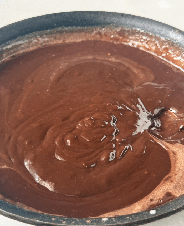 Chocolate ganache in pan.