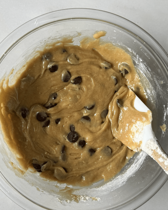 Creamy dough in glass bowl.