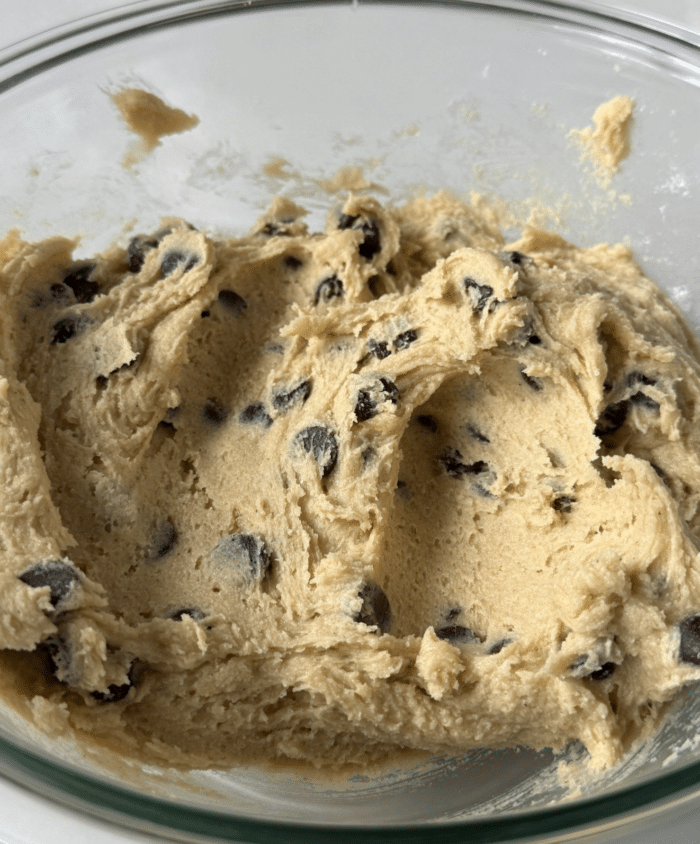 Thick dough in glass bowl.