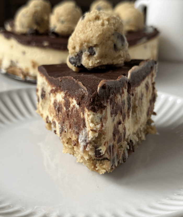Sliced cheesecake on plate.