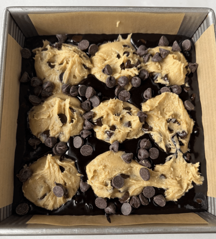 Balls of cookie dough in pan.
