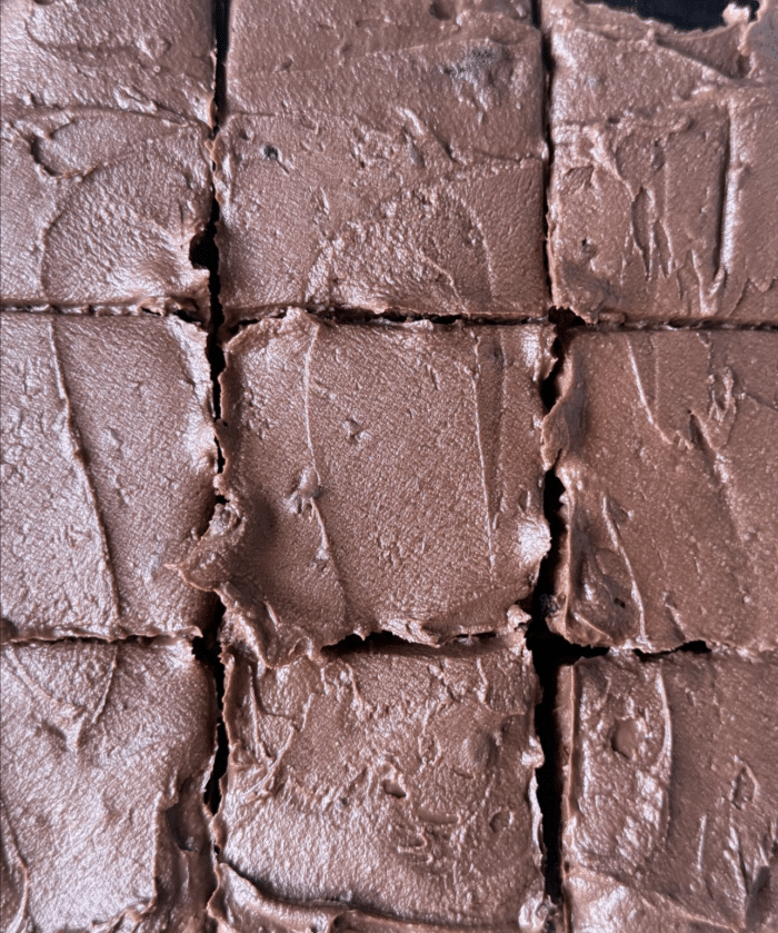 Sliced brownies with frosting.