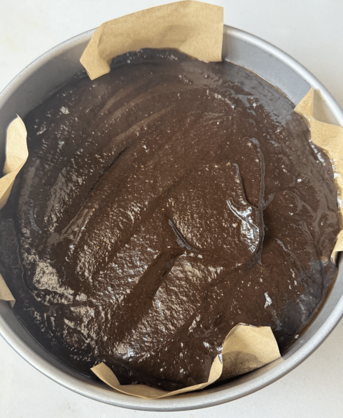 Brown batter in circle pan.