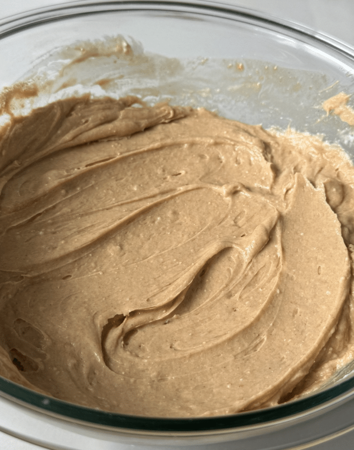 Thick batter in glass bowl.