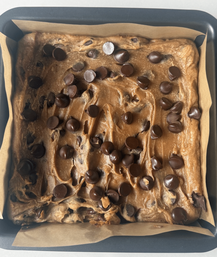 Peanut butter chocolate dessert in pan.