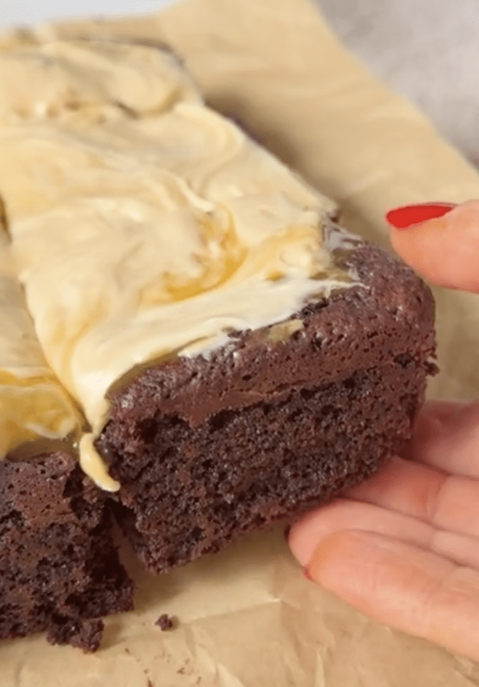 Hand with chocolate bar.