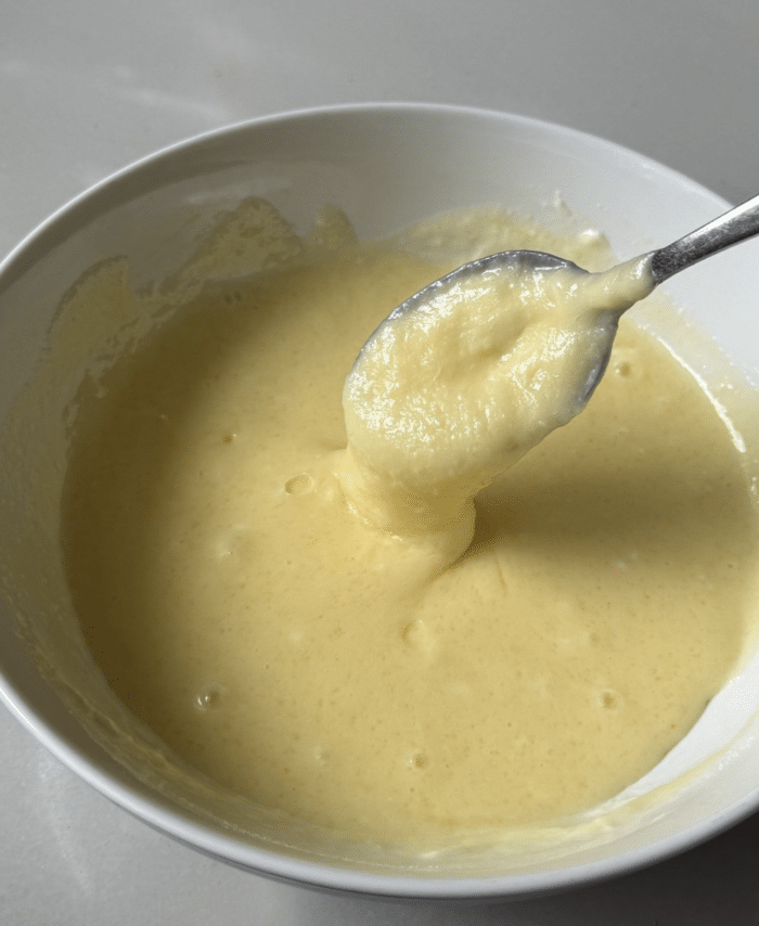 Cheesecake filling in bowl.