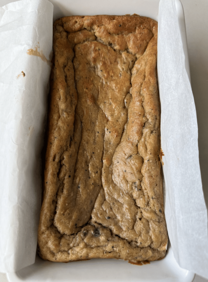 Baked bread in loaf pan.