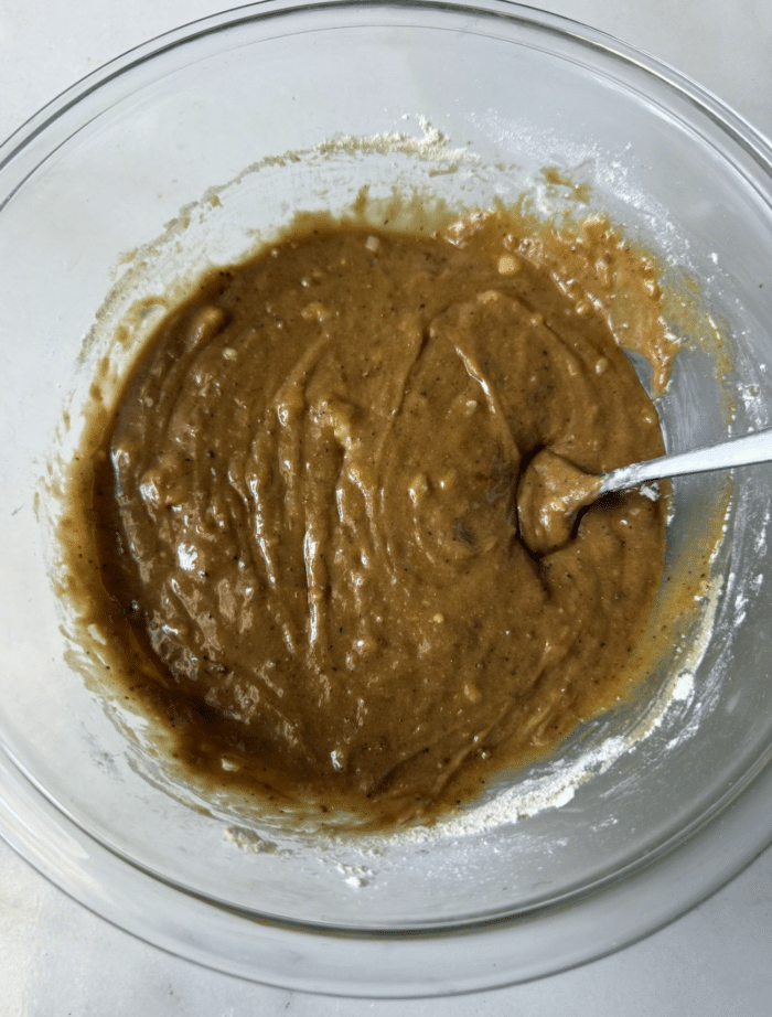 Brown dough in bowl.
