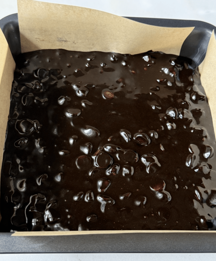 Brownie batter with chips.