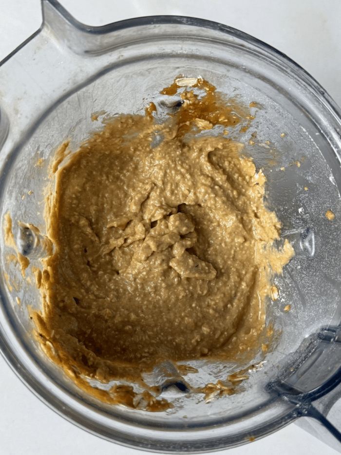 Orange batter in Vitamix.