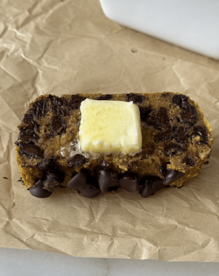 Butter on pumpkin banana bread.