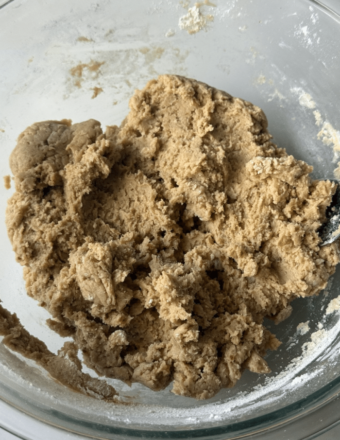 Thick dough in glass bowl.
