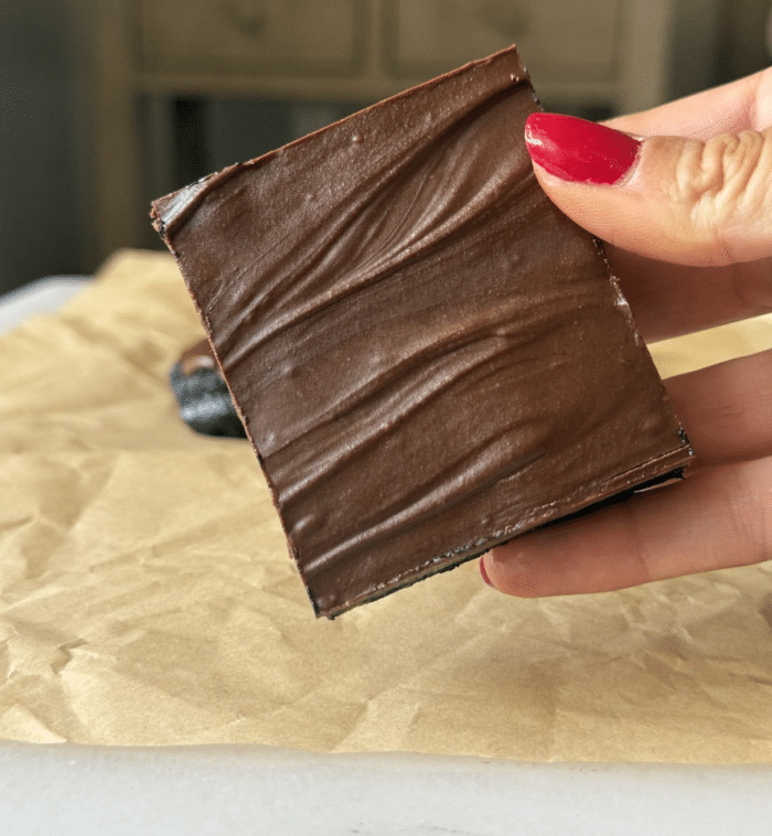 Hand with raw bar.