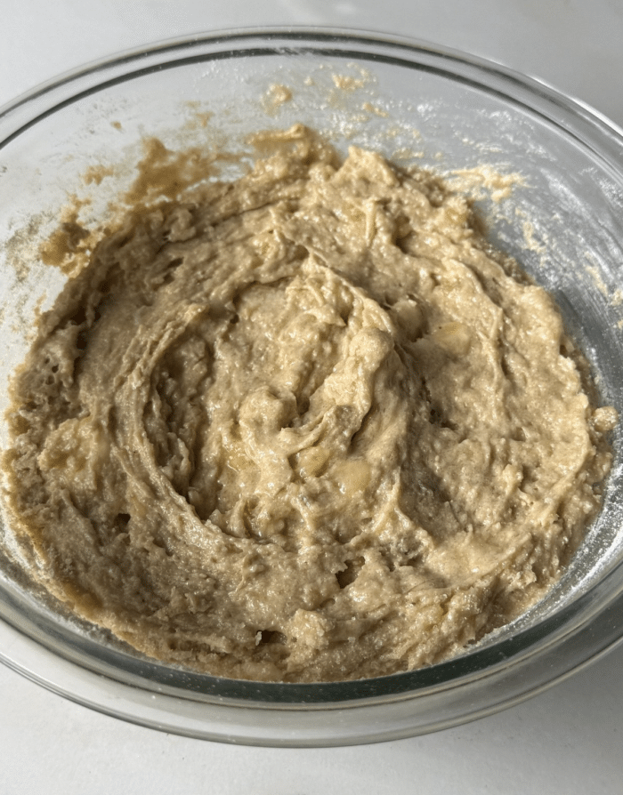 Banana mashed in bowl.
