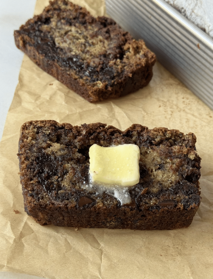 Fudge swirl banana bread with butter.
